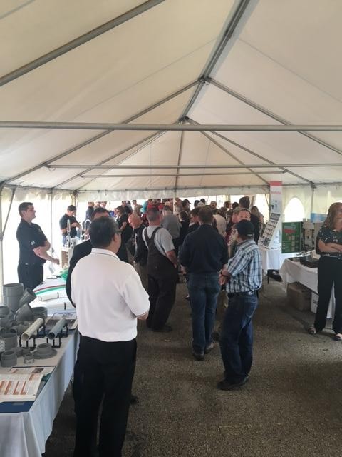 Customers line up for burgers at the annual Fort Road Customer Appreciation BBQ